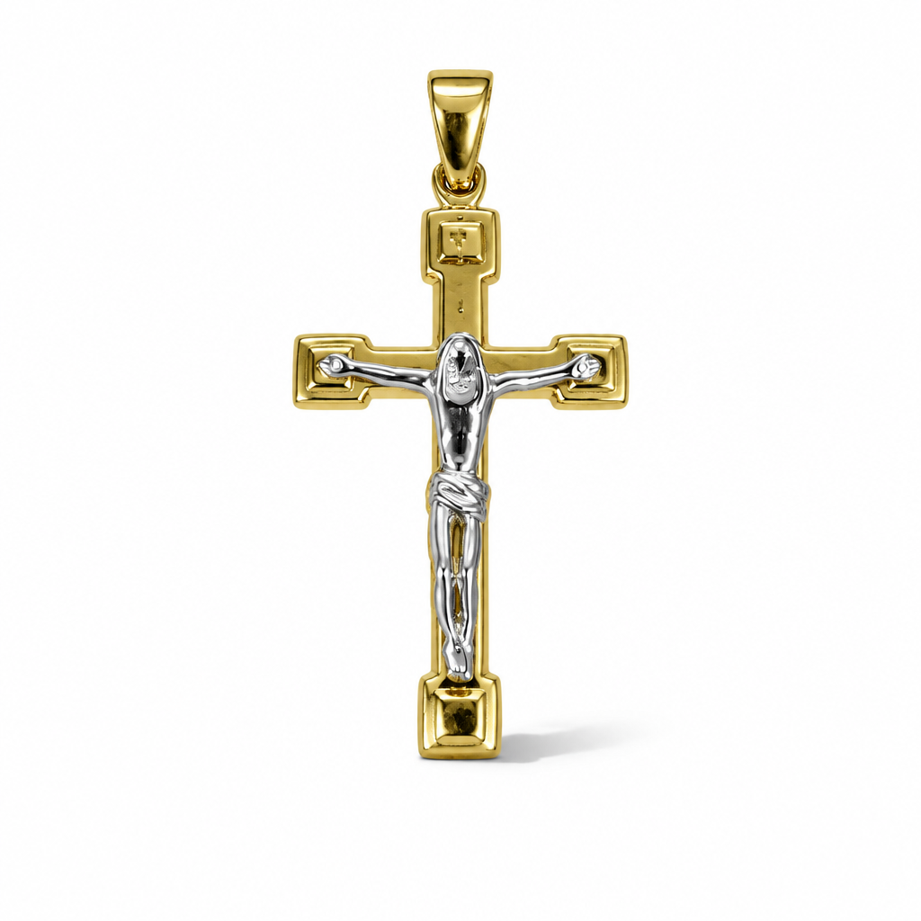 Croce bicolore in oro 18 carati con Cristo dal tono bianco, bracci dorati e terminali squadrati, 42×22 mm, vista frontale

