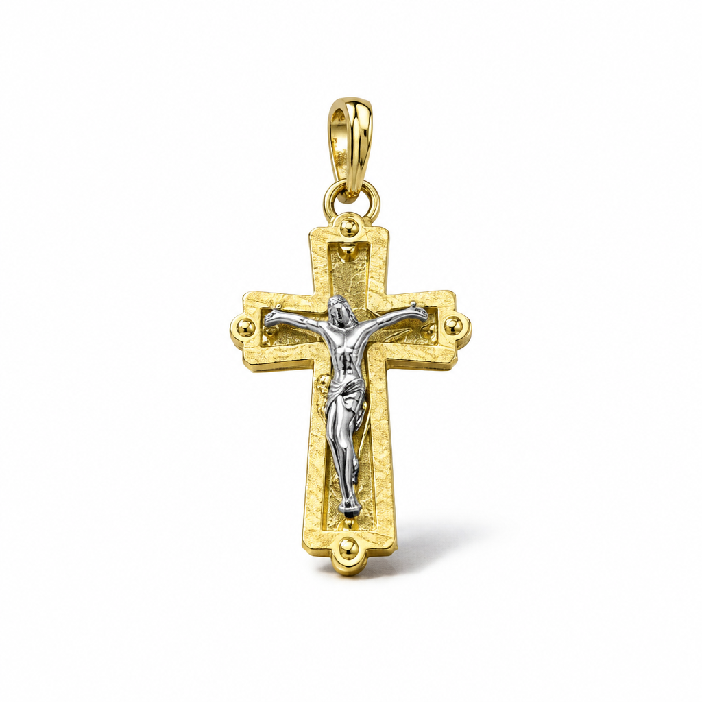 Croce bicolore in oro 18 carati con Cristo, cornice lavorata e dettagli sferici in rilievo, vista frontale
