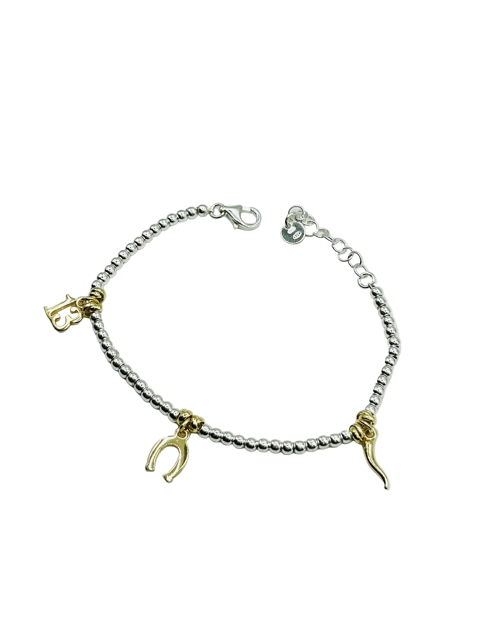 Bracciale charm argento 925 e oro 18k, sfere con ciondoli portafortuna, stile elegante.