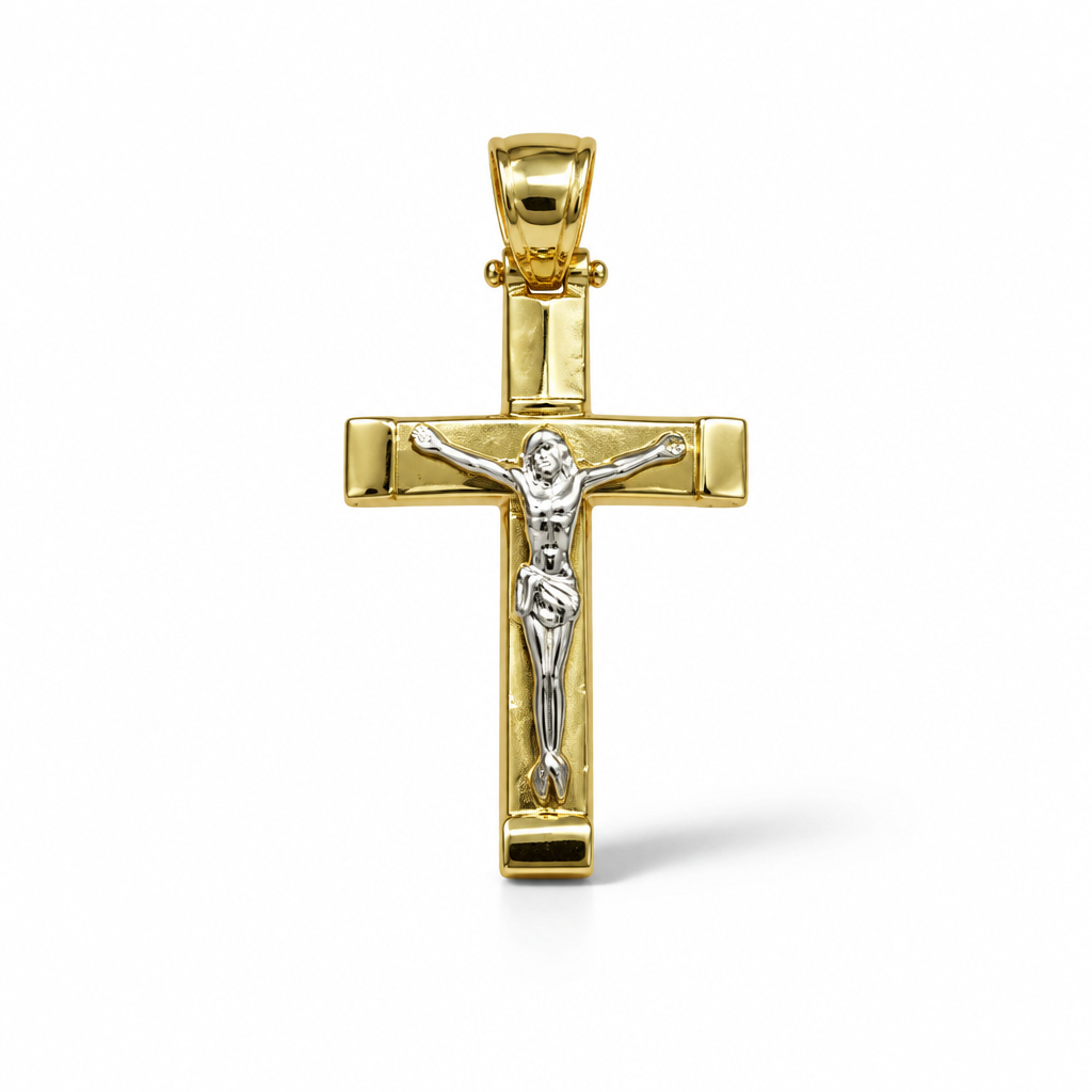 Croce bicolore in oro 18 carati con Cristo, bracci squadrati e terminali lucidi, 32×18 mm, vista frontale
