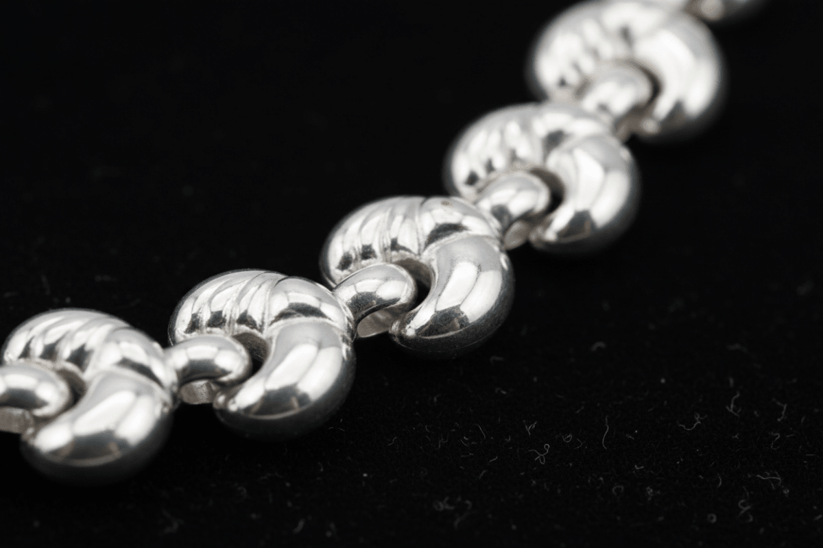 Dettaglio macro nodi a cuore maglia cuore bracciale argento 925 – CM Silver Jewels