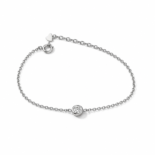 Bracciale punto luce in argento 925 con zircone rotondo, catena sottile, chiusura ad anello e prolunga con targhetta a cuore
