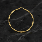 Detail Shot – Macro superficie twist piatta oro