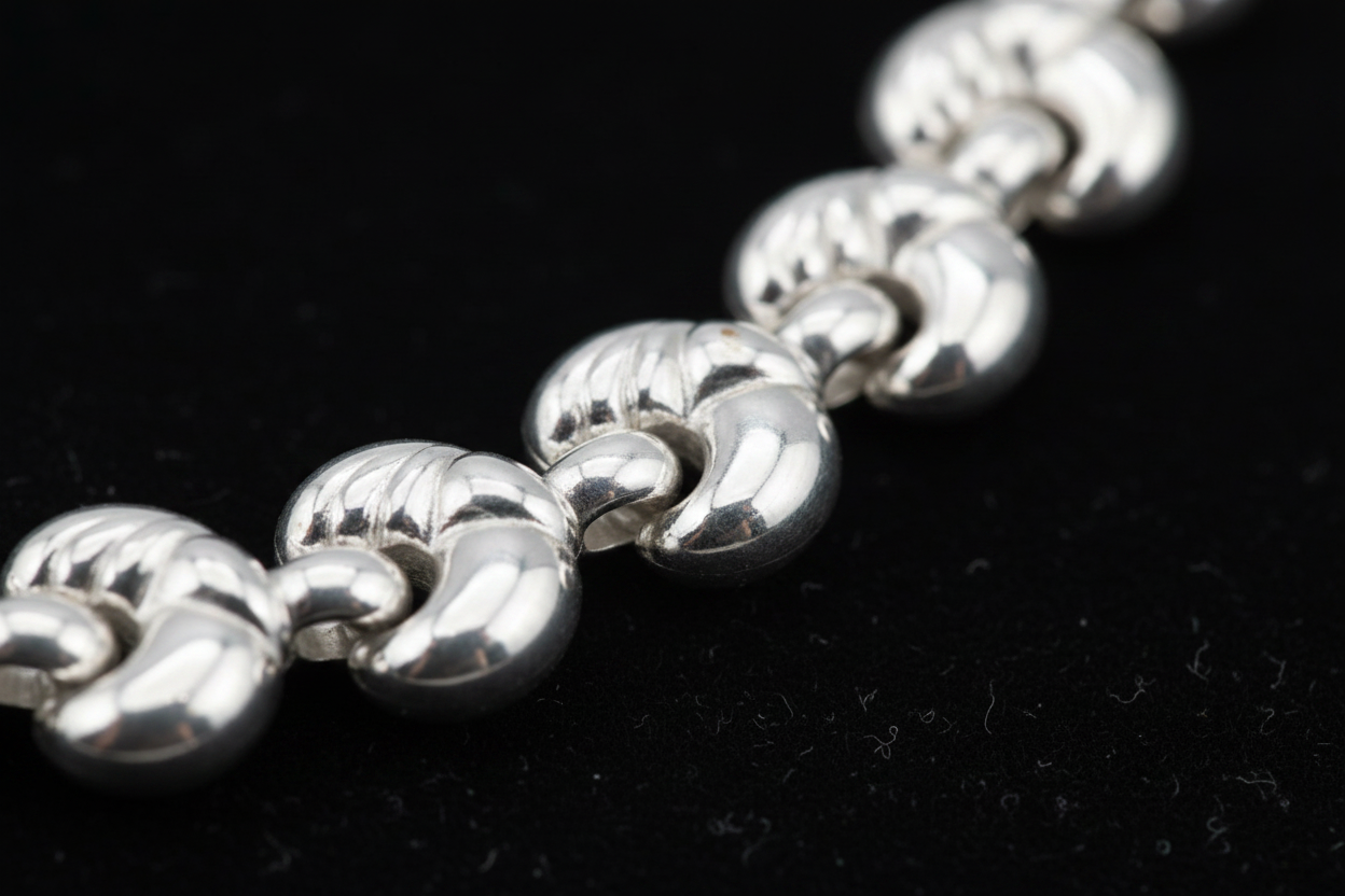 Dettaglio macro nodi a cuore maglia cuore bracciale argento 925 – CM Silver Jewels