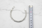 Bracciale argento 925 maglia scatolata 19 cm su marmo con riferimento scala – CM Silver Jewels