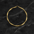 Detail Shot – Macro superficie twist piatta oro